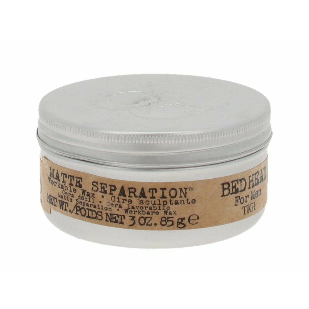 Runde Dose mit silbernem Deckel. Aufkleber mit Aufschrift "Matte Separation Workable Wax" und "Bed Head For Men Tigi".