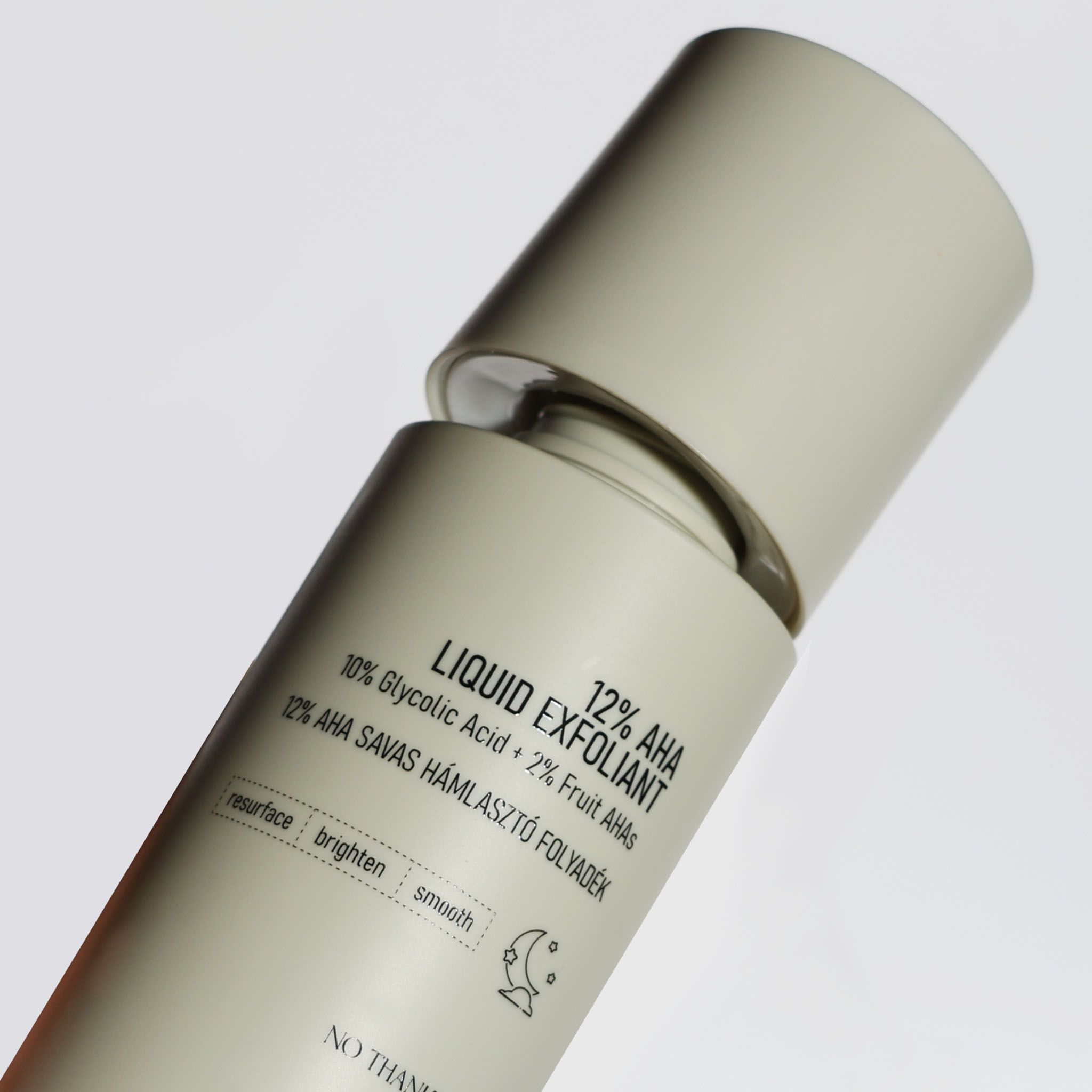 Flasche 12% AHA Liquid Exfoliant, mit Text.