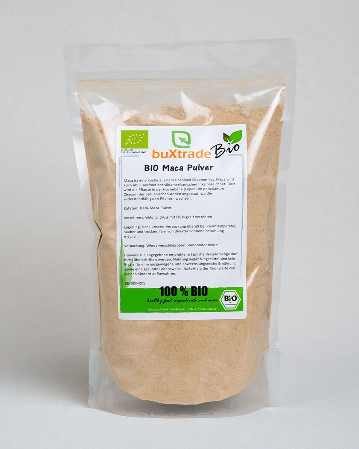 Buxtrade Bio Maca Pulver in einem Standbodenbeutel mit Etikett und Bio-Siegel.
