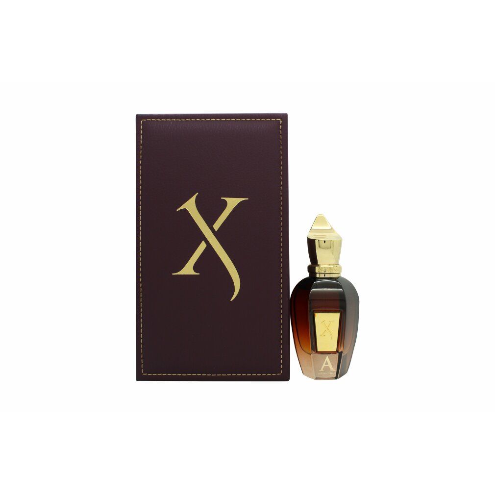 Braune Flasche mit goldener Kappe und brauner Verpackung mit goldenem Logo. Aufschrift "X" und "A".