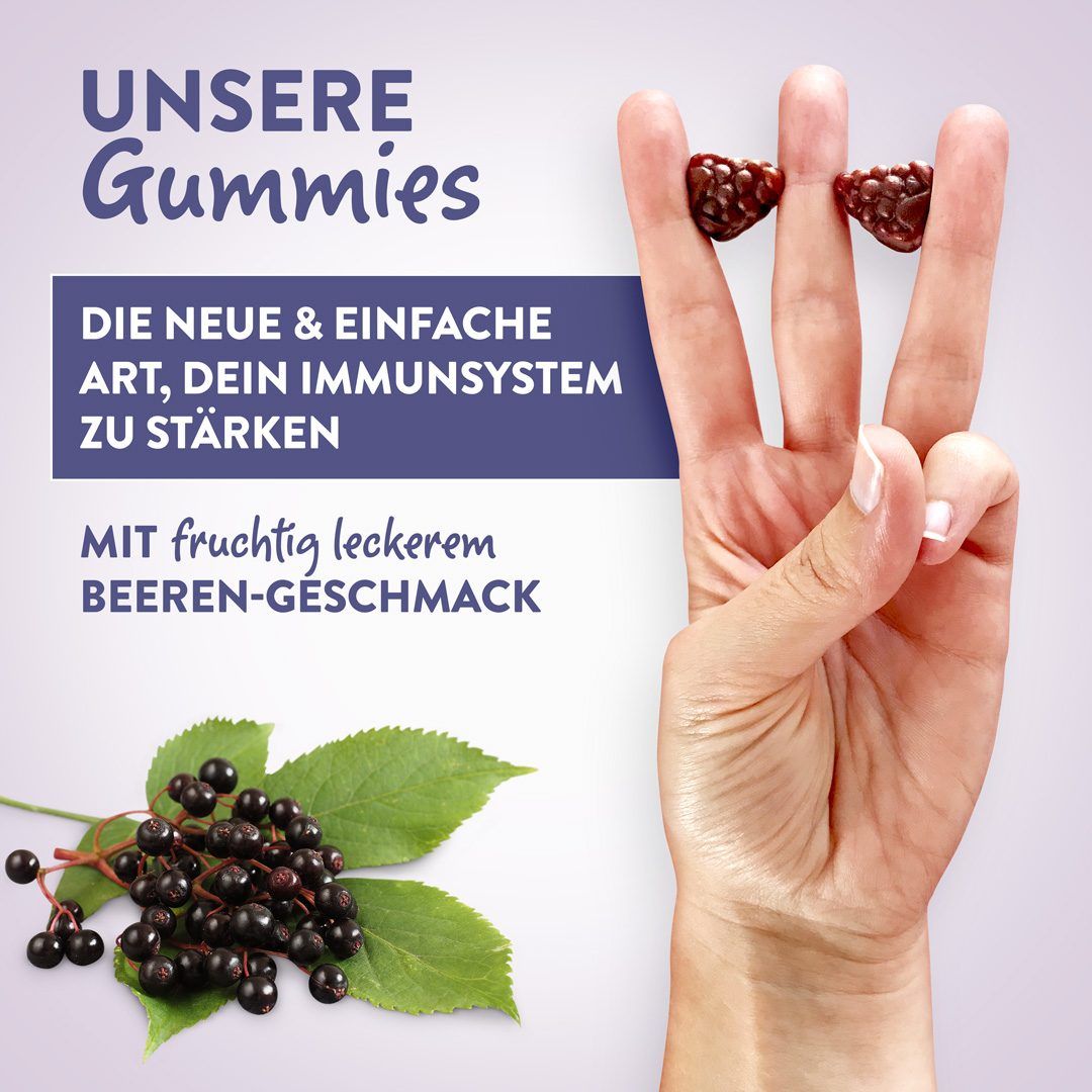 Hand mit drei Gummies auf den Fingern. Text: Die neue & einfache Art, dein Immunsystem zu stärken. Mit fruchtig leckerem Beeren-Geschmack.