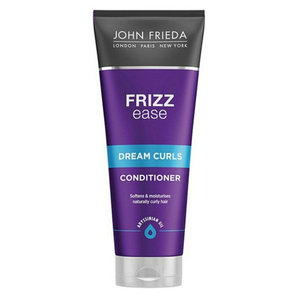 John Frieda Frizz Ease Traumlocken Conditioner. Lila Tube mit blauer Schrift. Enthält Abyssinian Oil. Text: Dream Curls, Conditioner.