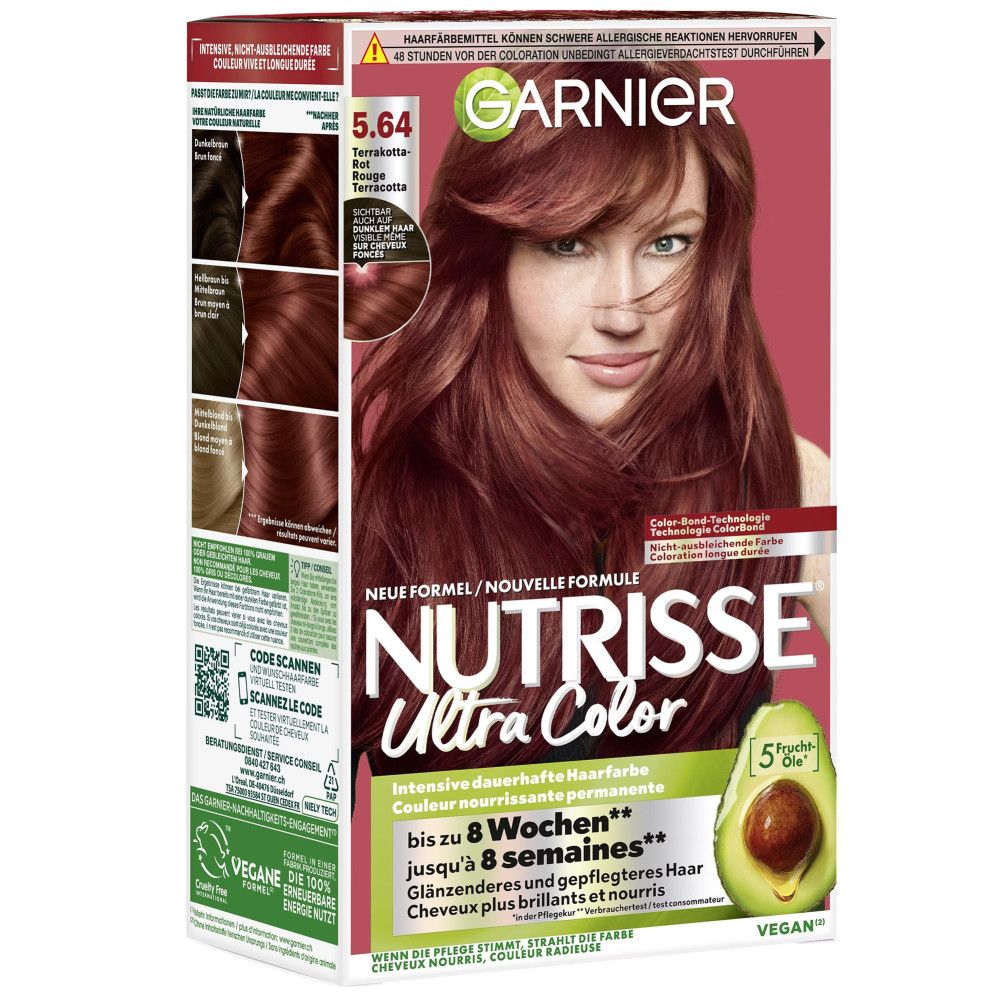 Garnier Nutrisse Ultra Color. Haarfarben-Verpackung mit Frau, die Haarfarbe 5.64 trägt. Avocado-Symbol. Vegan-Siegel.