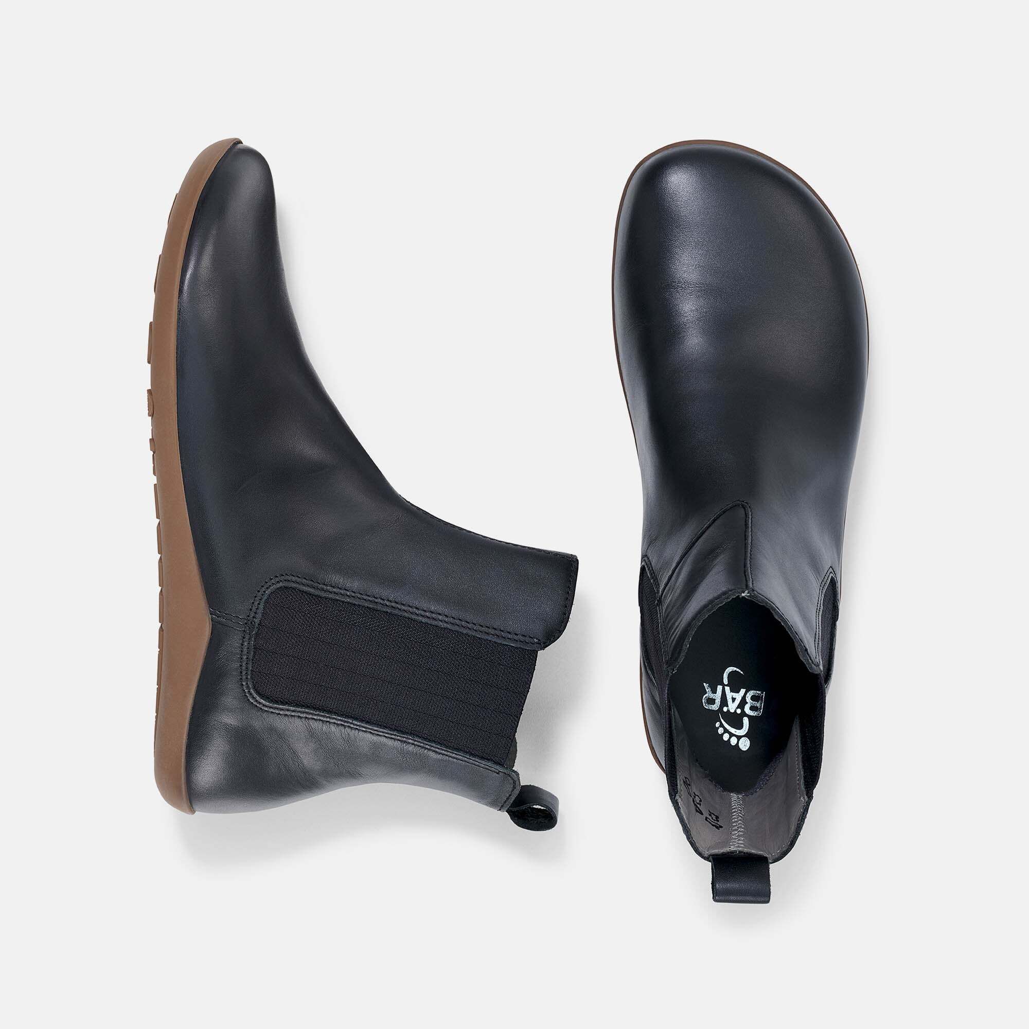 Grauer Wildleder-Bootie mit seitlichem Reißverschluss und Schnürung.