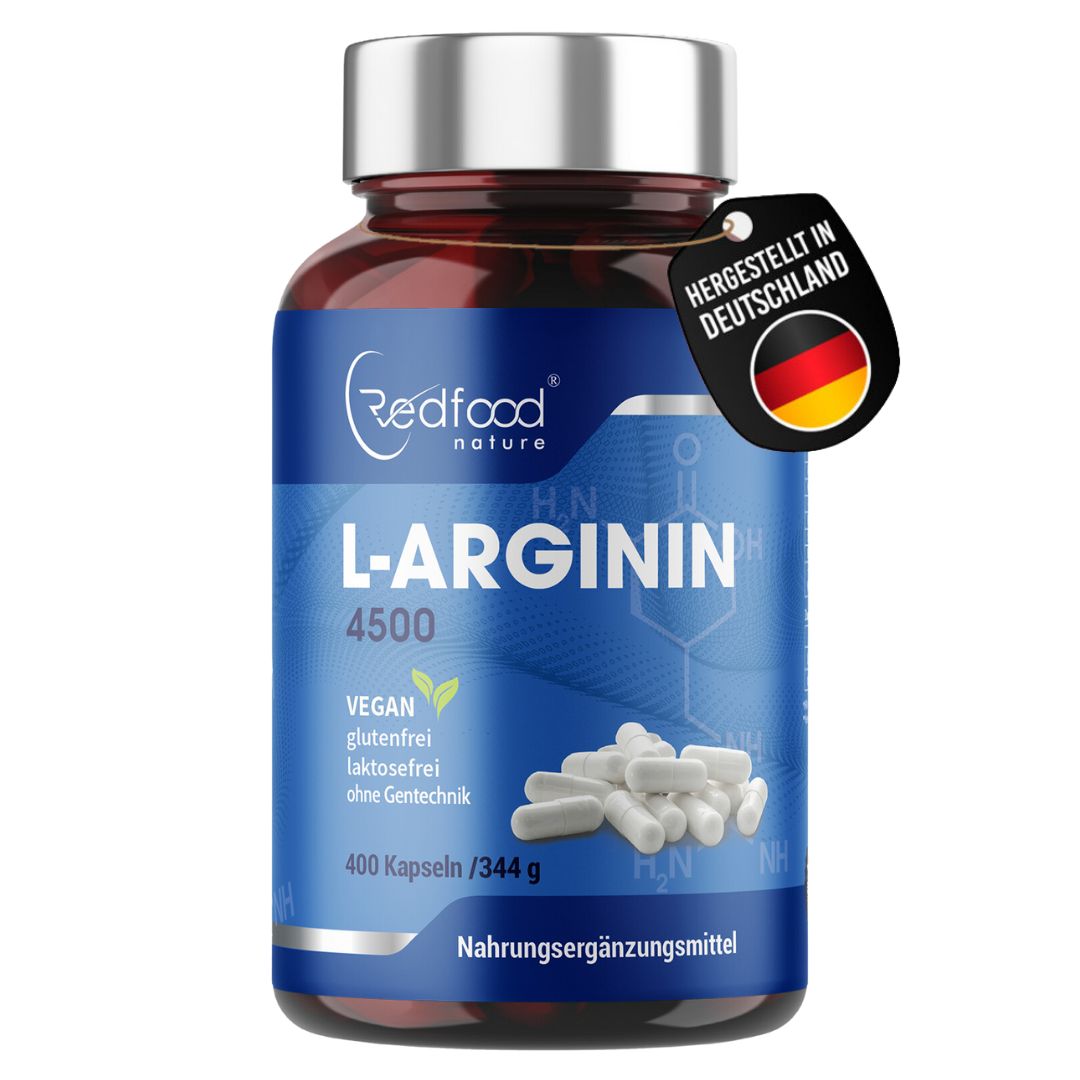 Braune Glasflasche mit weißen Kapseln. Aufschrift: Redfood L-Arginin 4500. Vegan, glutenfrei, laktosefrei. Hergestellt in Deutschland.