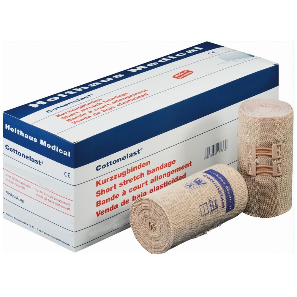 Verbandrollen und Verpackung. Auf der Verpackung steht: Cottonelast Kurzzugbinde, Short stretch bandage. CE-Zeichen.