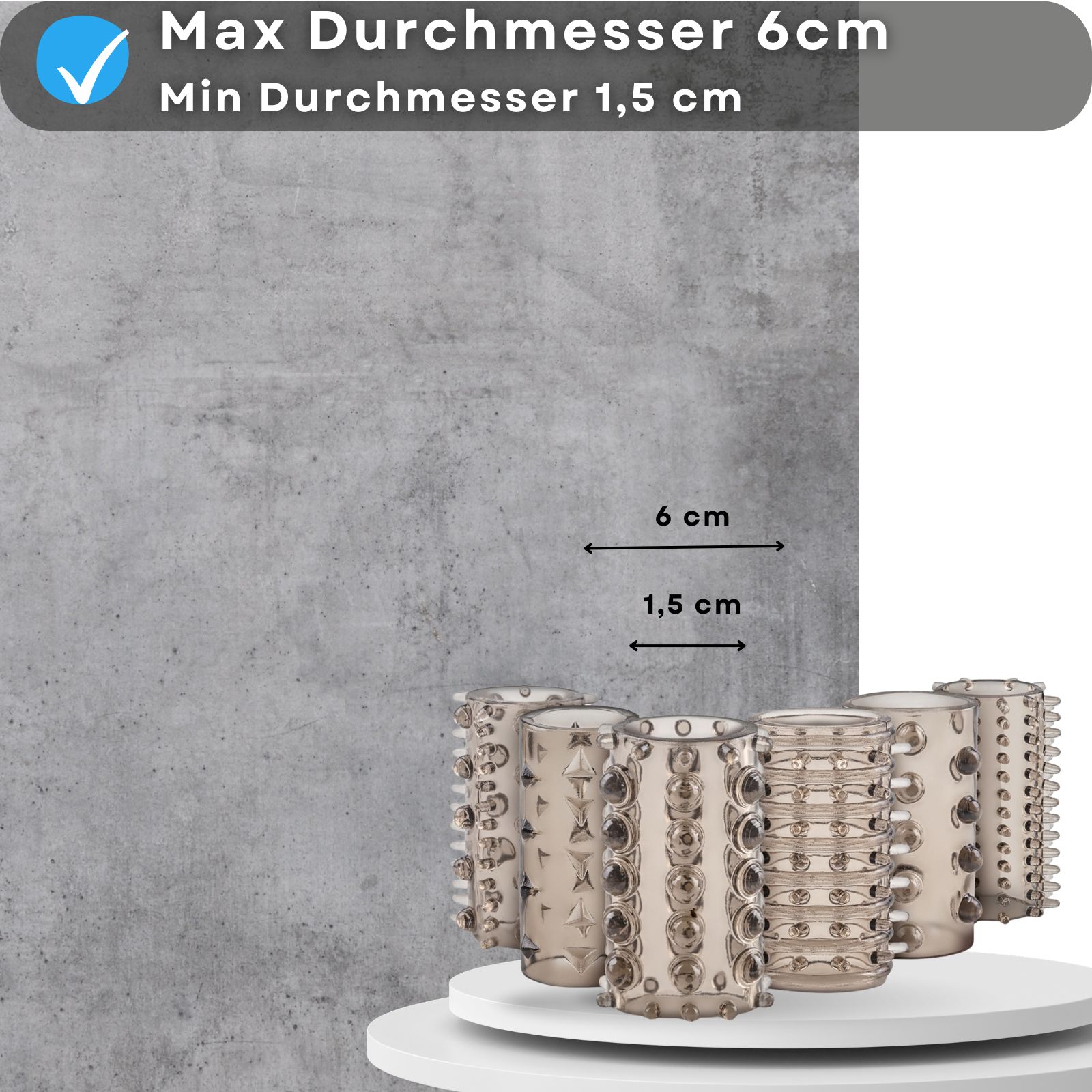 Produktabbildung mit Text: Max Durchmesser 6cm, Min Durchmesser 1,5 cm. Penishüllen im Vordergrund.