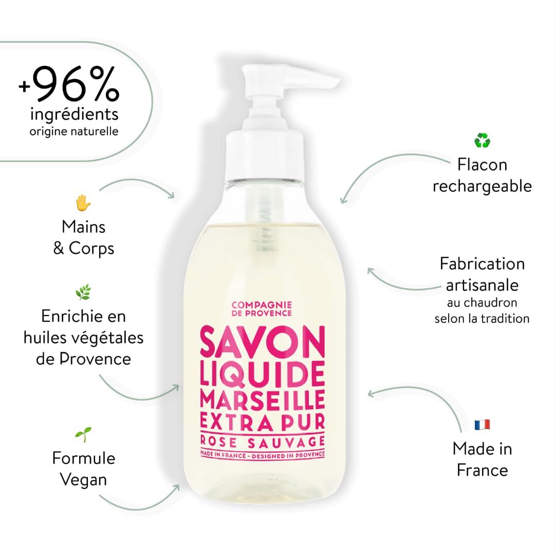 Produktflasche mit rosa Etikett und weißen Icons. Text: +96% Ingrédients origine naturelle, Mains & Corps, Formule Vegan, etc.
