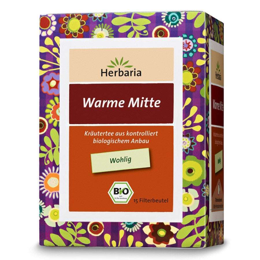 Verpackung mit Herbaria Warme Mitte Tee. Aufschrift: Warme Mitte, Kräutertee aus kontrolliert biologischem Anbau, Bio-Siegel, 15 Filterbeutel.