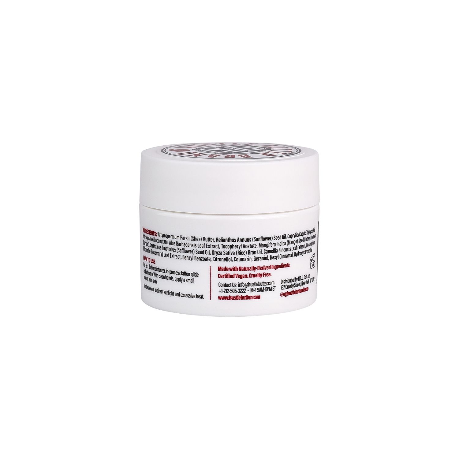 Weißes Tiegel mit Text. "Hustle Butter Tattoo Balm". Zutatenliste und Kontaktinformationen.