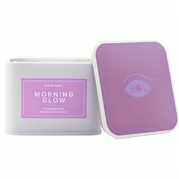 Weiße Dose mit lila Etikett, 'Morning Glow Pheromone Massage Candle' und EOL-Logo.