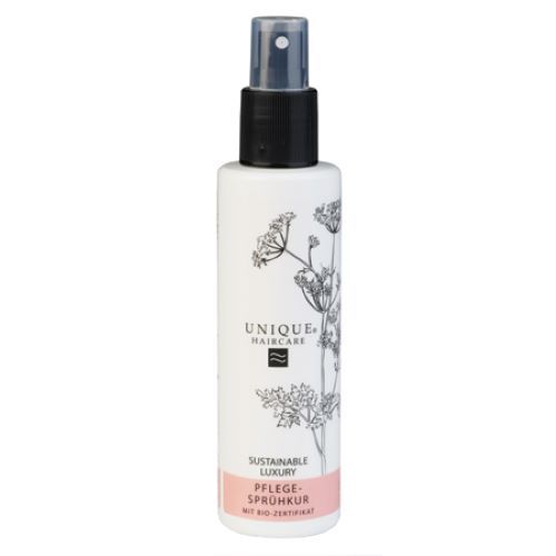 Weiße Sprühflasche mit schwarzem Sprühkopf. Aufdruck: UNIQUE HAIRCARE, Pflege-Sprühkur, Bio-Zertifikat.