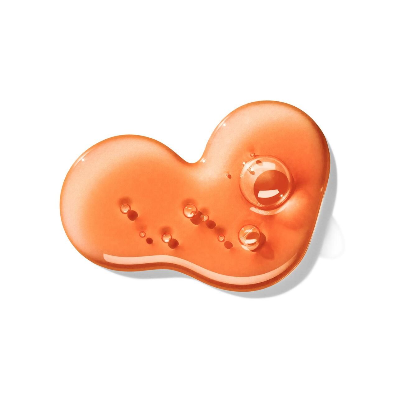 Orangenes Gel mit Blasen auf weißem Hintergrund. Geleeartige Textur.