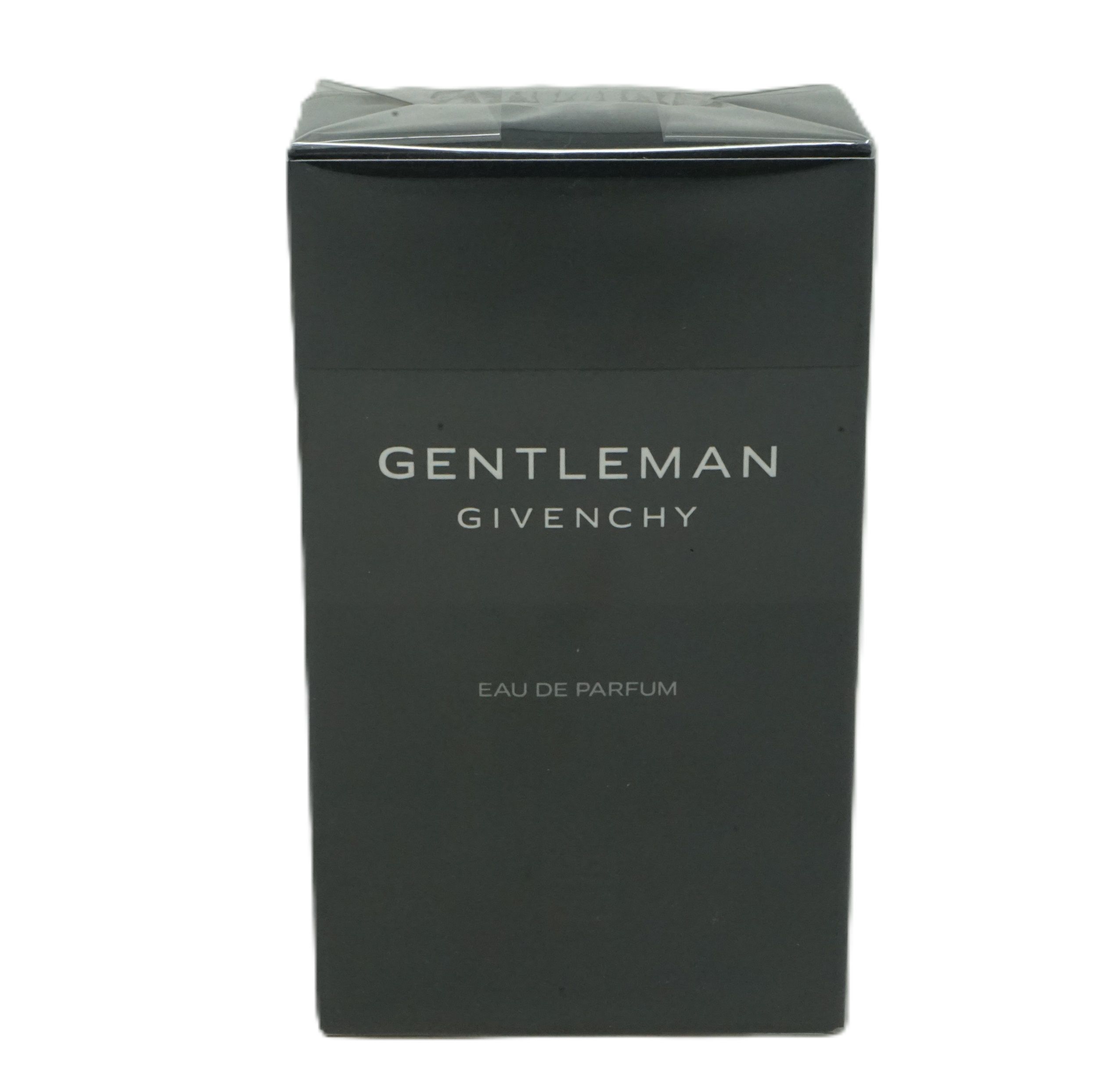 Schwarzer Karton mit weißem Schriftzug GENTLEMAN GIVENCHY und Eau de Parfum. Verschlussfolie.