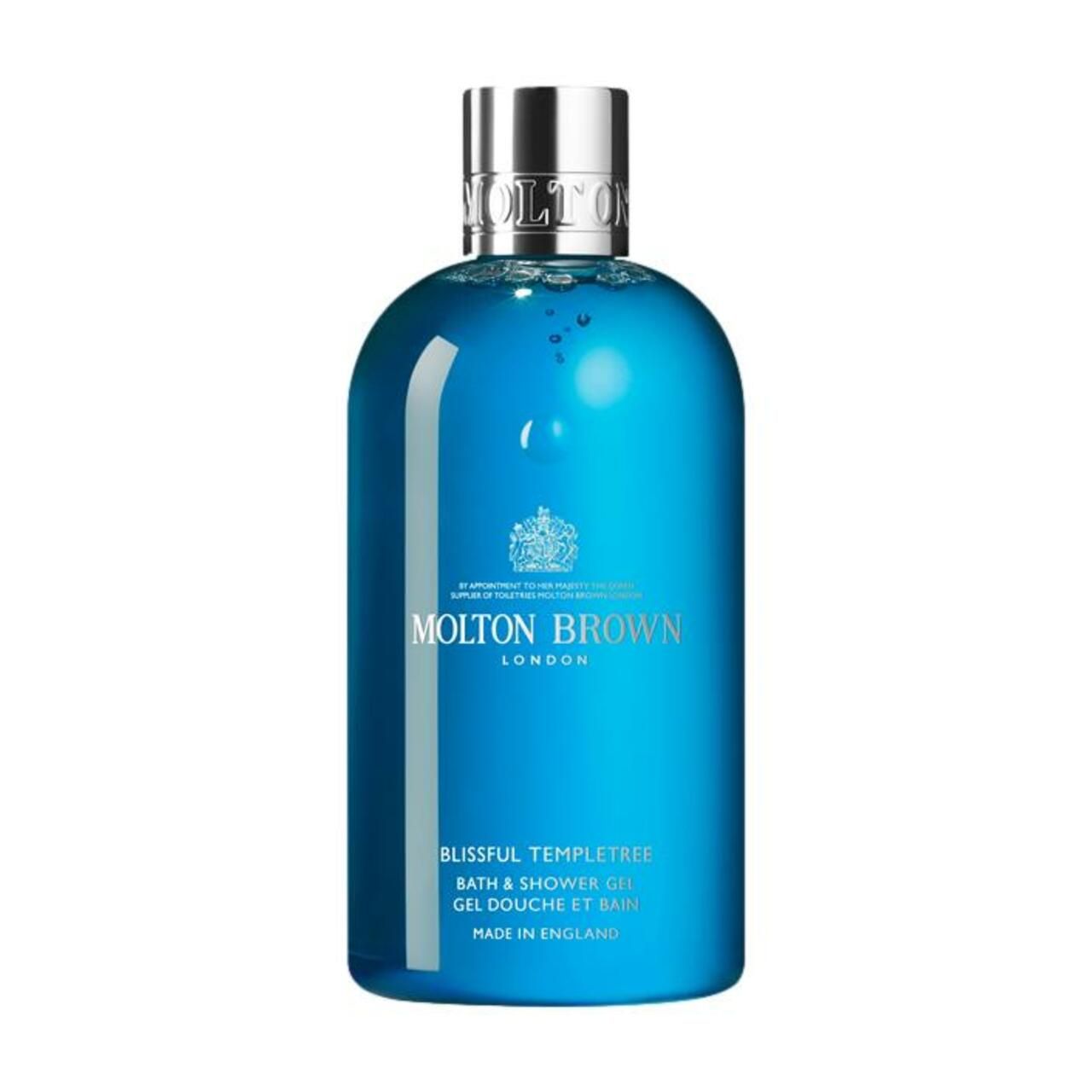 Blaues Duschgel in einer Flasche mit silbernem Deckel. Aufschrift: Molton Brown, Blissful Templetree, Bade- und Duschgel.