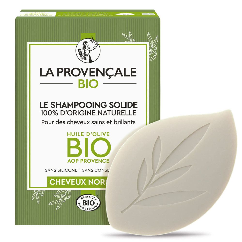 Festes Shampooo mit Bio-Olivenöl. Grün-weiße Verpackung mit Produktinformationen. Blattförmiges Shampoo.