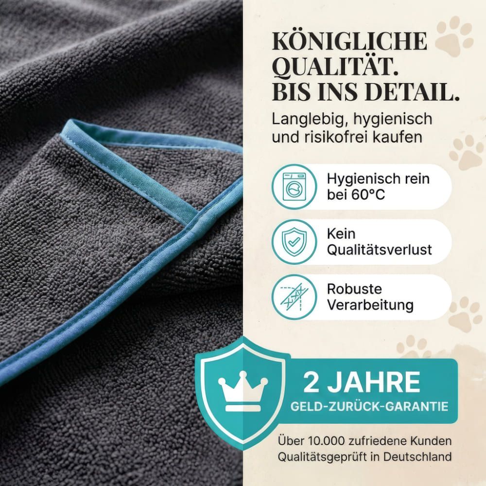 Nahaufnahme eines grauen Hundehandtuchs mit blauem Rand. Text: Königliche Qualität. 2 Jahre Geld-zurück-Garantie.