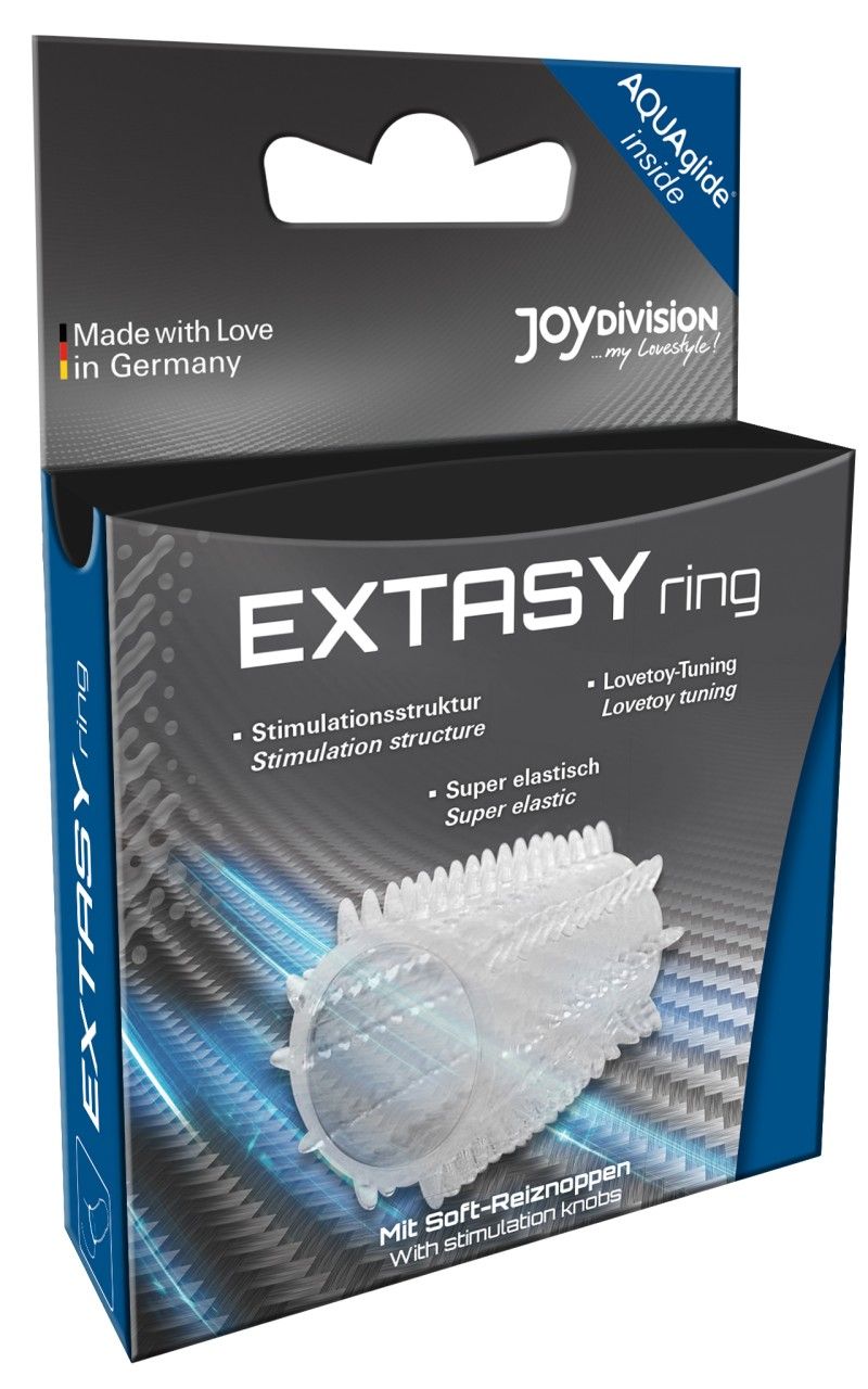 EXTASYring mit Stimulationstruktur und Aquaglide-Sachet in schwarzer Geschenkbox.