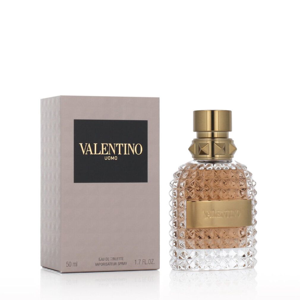 Valentino Uomo Eau de Toilette. Flakon und Verpackung. Goldfarbener Verschluss, Label. Verpackung mit Logo.