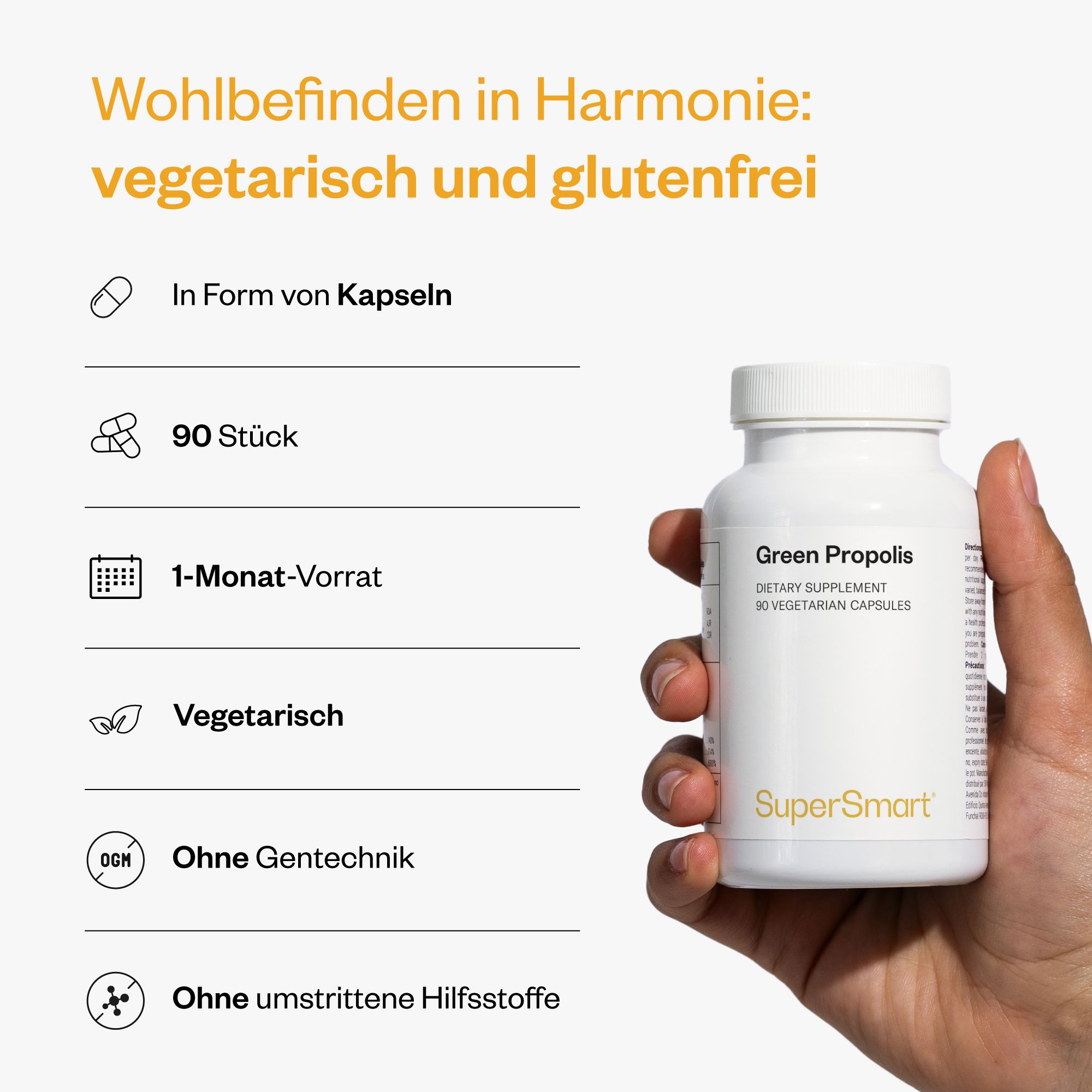 Flasche Green Propolis in Hand gehalten. 90 Stück, vegetarisch, ohne Gentechnik, ohne umstrittene Hilfsstoffe. Marke: SuperSmart.