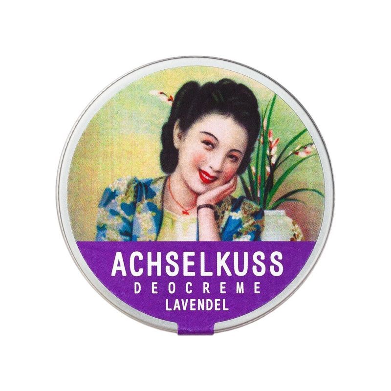 Runde Dose mit lila Etikett. Auf dem Etikett steht "ACHSELKUSS DEOCREME LAVENDEL". Auf dem Deckel ist eine Frau abgebildet.