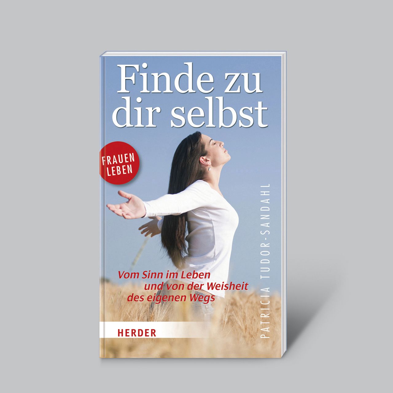 Buchcover mit Titel "Finde zu dir selbst". Frau mit offenen Armen vor Getreidefeld. Zusatz: Frauen Leben, Herder.