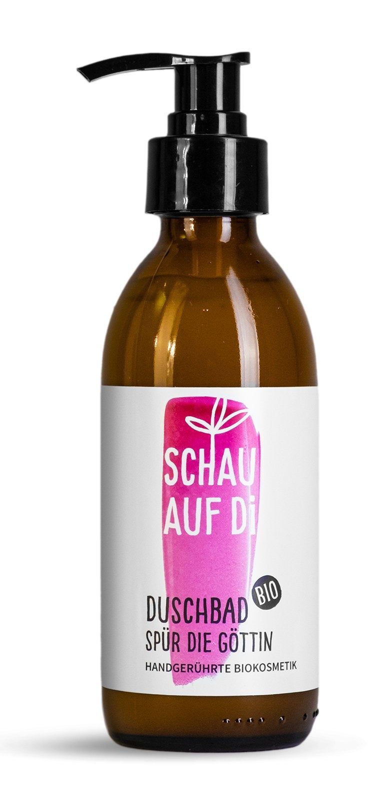 Braune Glasflasche mit schwarzem Pumpkopf. Etikett mit Text: SCHAU AUF DI, Duschbad, Spür die Göttin. Bio-Siegel.