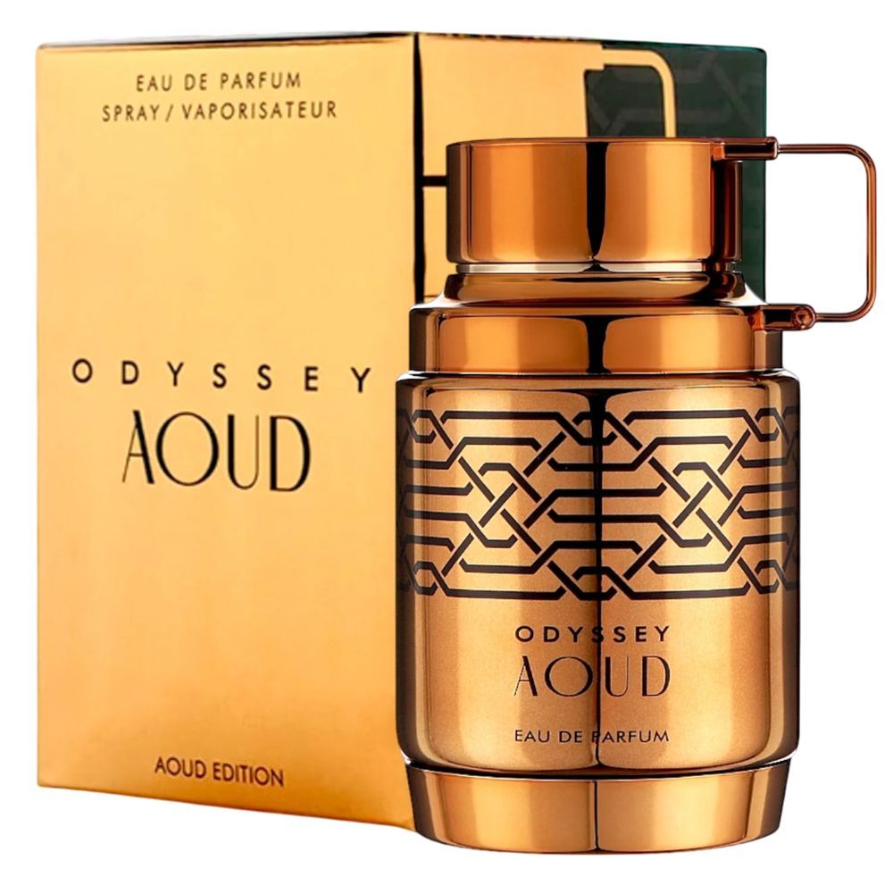 Goldfarbener Flakon und Karton. Aufschrift: Odyssey Aoud Eau de Parfum. Mit Henkel. Schwarzes Muster auf dem Flakon.