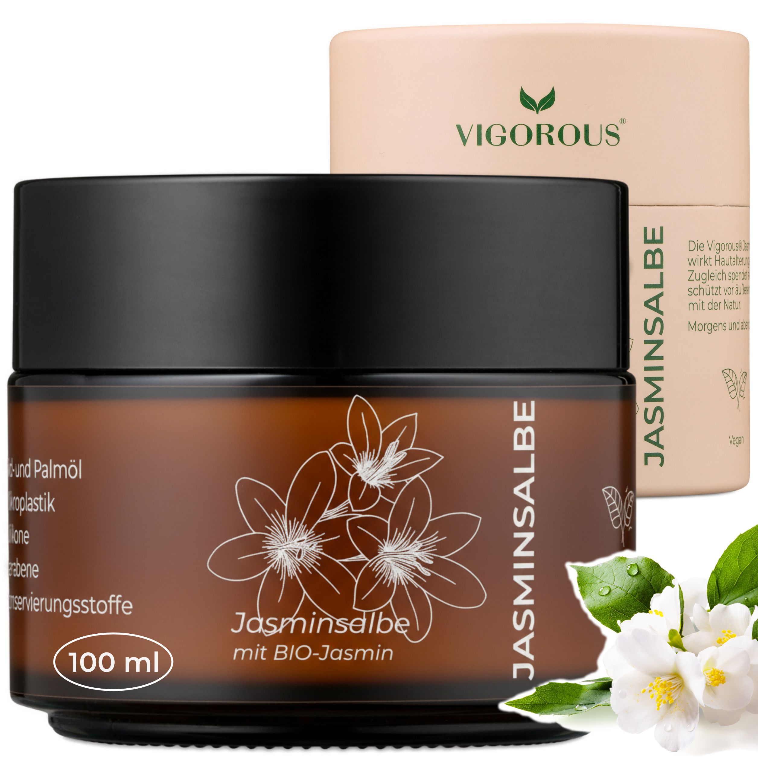 Braune Creme-Dose mit schwarzem Deckel und Schriftzug Jasminsalbe. Daneben eine Pappverpackung mit Logo und Text. Jasminblüten.