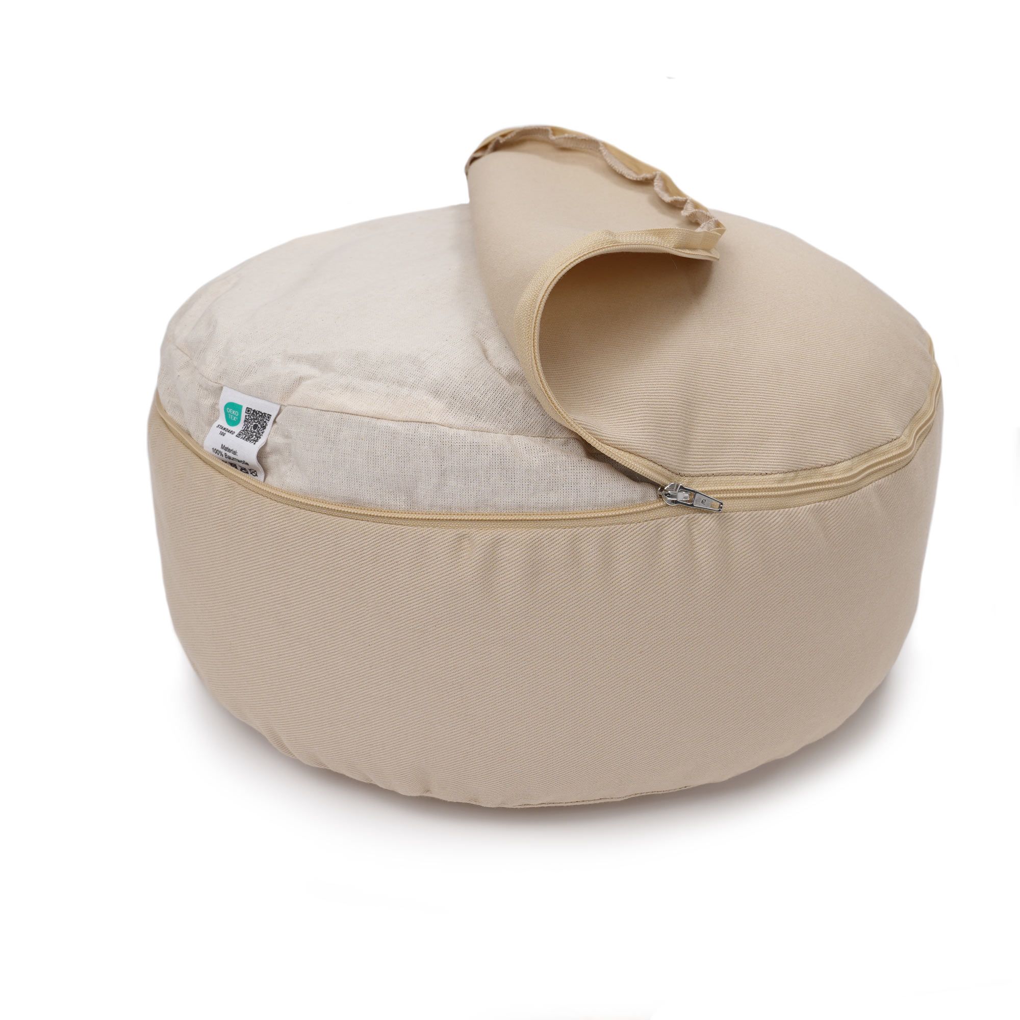 Sandfarbenes Yogakissen mit geöffneter Hülle, Innenbezug sichtbar.