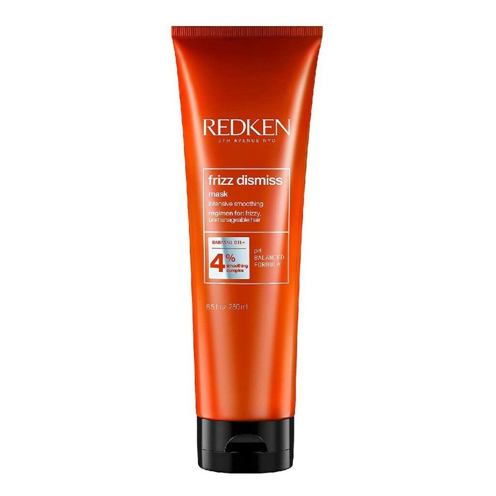Orangefarbene Tube mit schwarzem Deckel. Aufschrift: Redken Frizz Dismiss Mask. Enthält 4% Smoothing Complex. pH-ausgeglichene Formel.