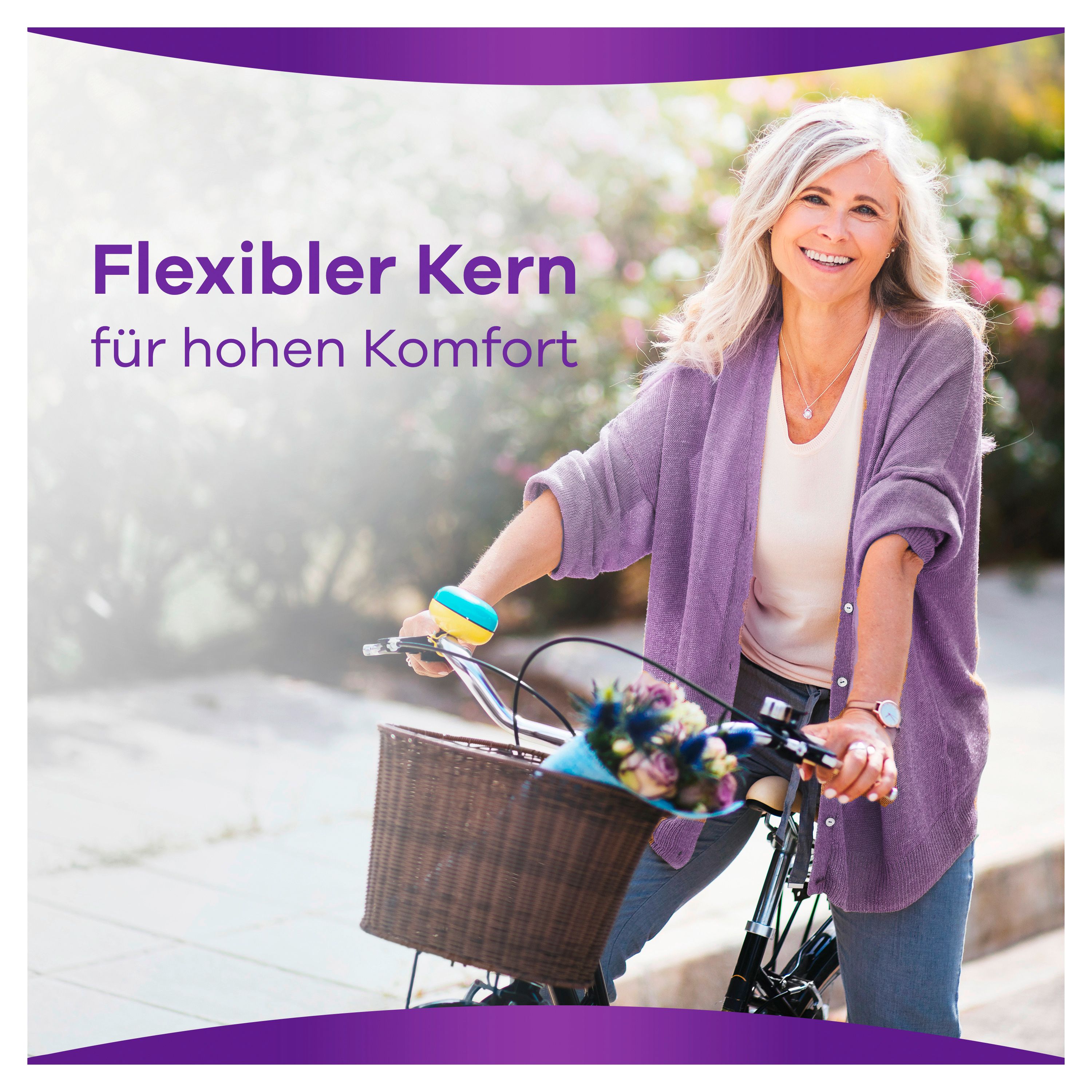 Ältere Frau auf einem Fahrrad. Sie trägt eine lila Jacke. Text: Flexibler Kern für hohen Komfort.