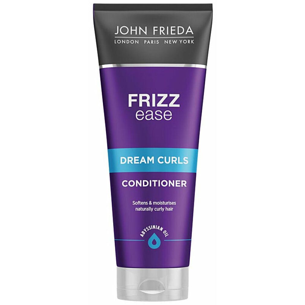 John Frieda Frizz Ease Traumlocken Conditioner. Lila Tube mit blauer Schrift. Enthält Abyssinian Oil. Text: Dream Curls, Conditioner.