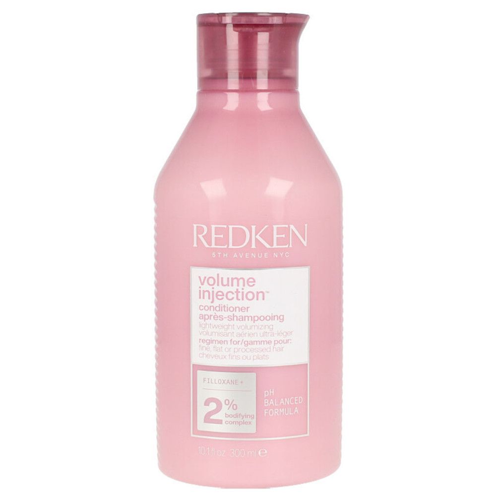 Rosa Flasche Redken Volume Injection Conditioner. Etikett mit Text. pH-ausgewogene Formel. 300ml.