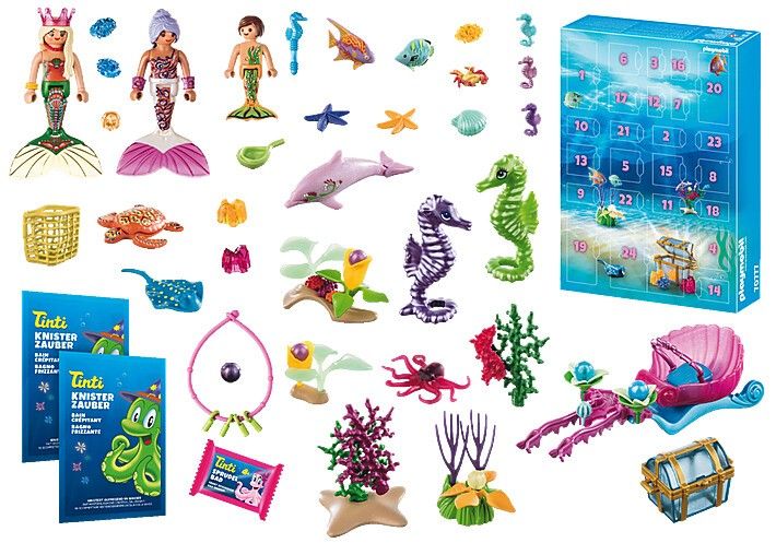 Adventskalender-Inhalt mit Figuren, Meerestieren und Zubehör. Enthält Tinti-Badespaß. 83 Teile.