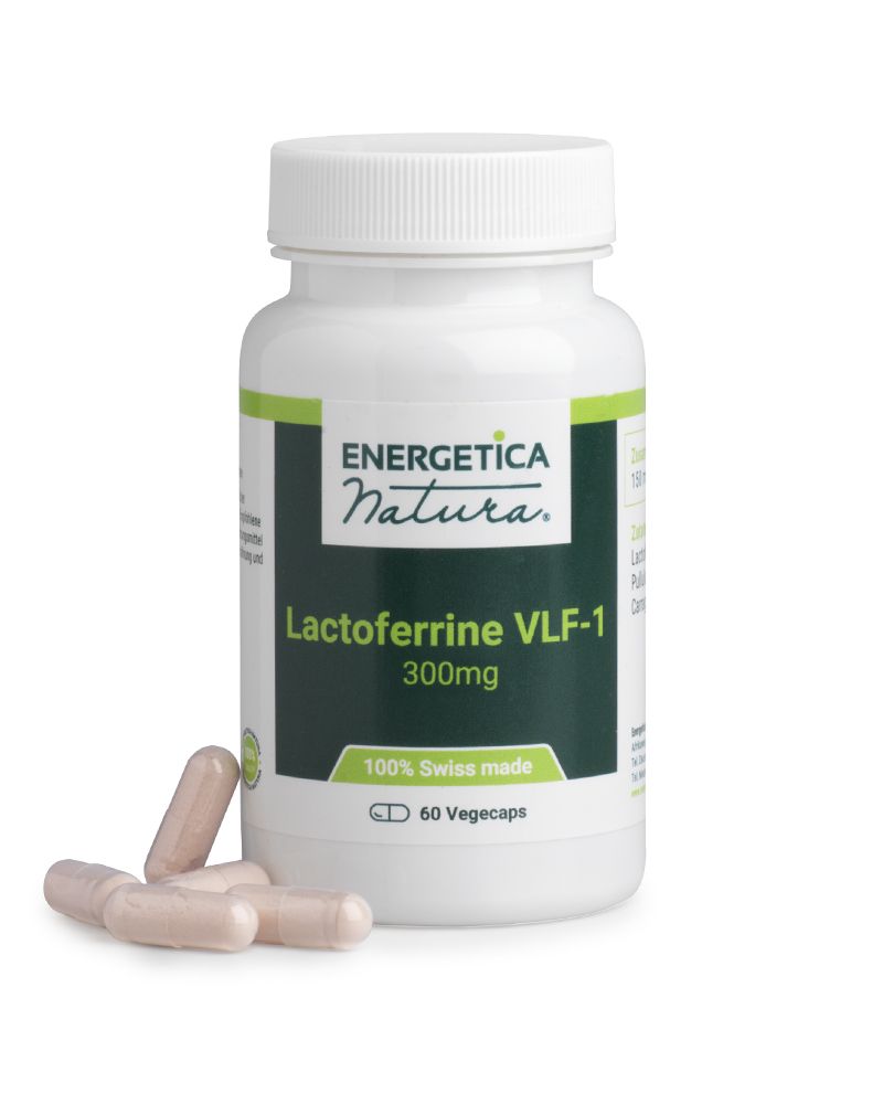 Weißes Fläschchen mit grüner Beschriftung. Daneben liegen einige Kapseln. Text: Lactoferrine VLF-1, 300 mg, 100% Swiss made, 60 Vegecaps.