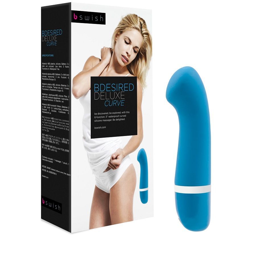 Blauer Silikonvibrator neben Verpackung. Verpackung mit Frau, Produktabbildung und Text "B Desired Deluxe Curve".
