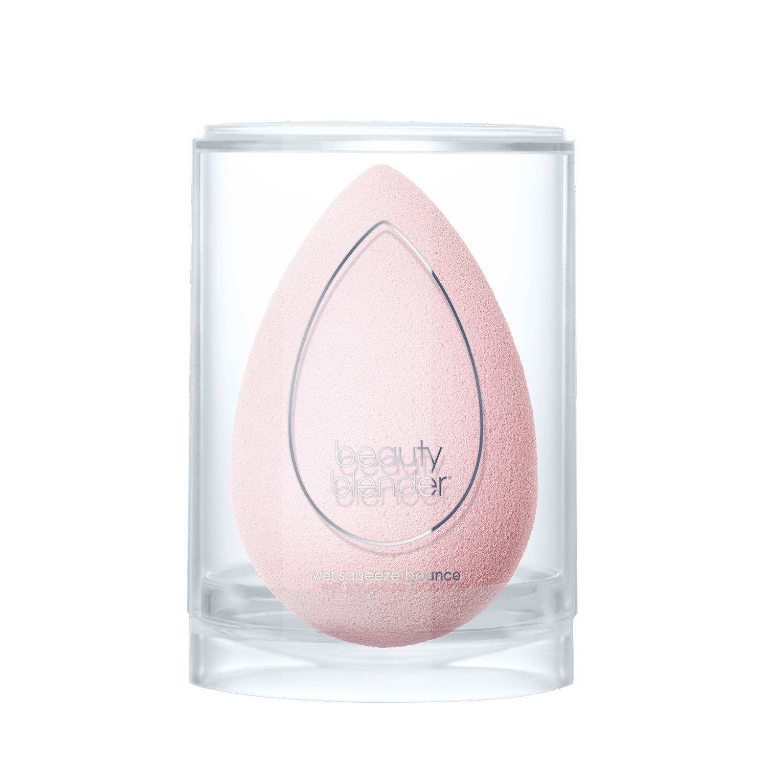 Rosa Beautyblender-Schwamm in klarer, zylindrischer Verpackung. Tropfenförmig mit abgerundeter Basis. Marke sichtbar.