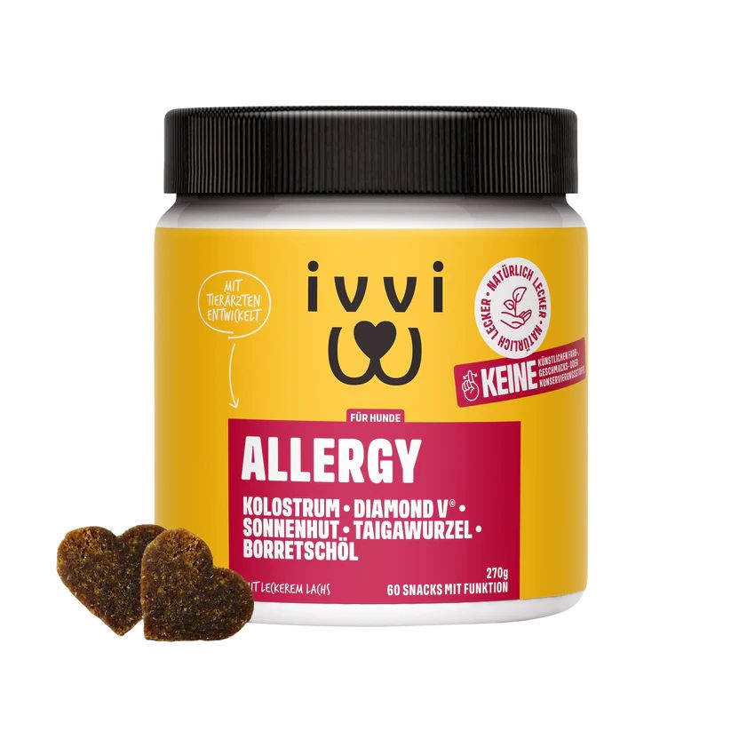 Gelbes Produktetikett mit schwarzem Deckel. Enthält "ivvi Allergy" für Hunde. Zwei herzförmige Snacks liegen daneben.