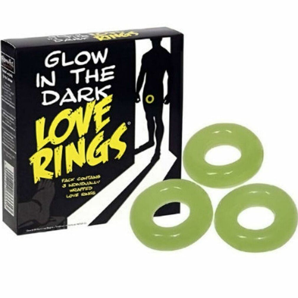 Drei leuchtende Ringe neben einer Produktverpackung. Verpackung mit Text: Glow in the Dark Love Rings.