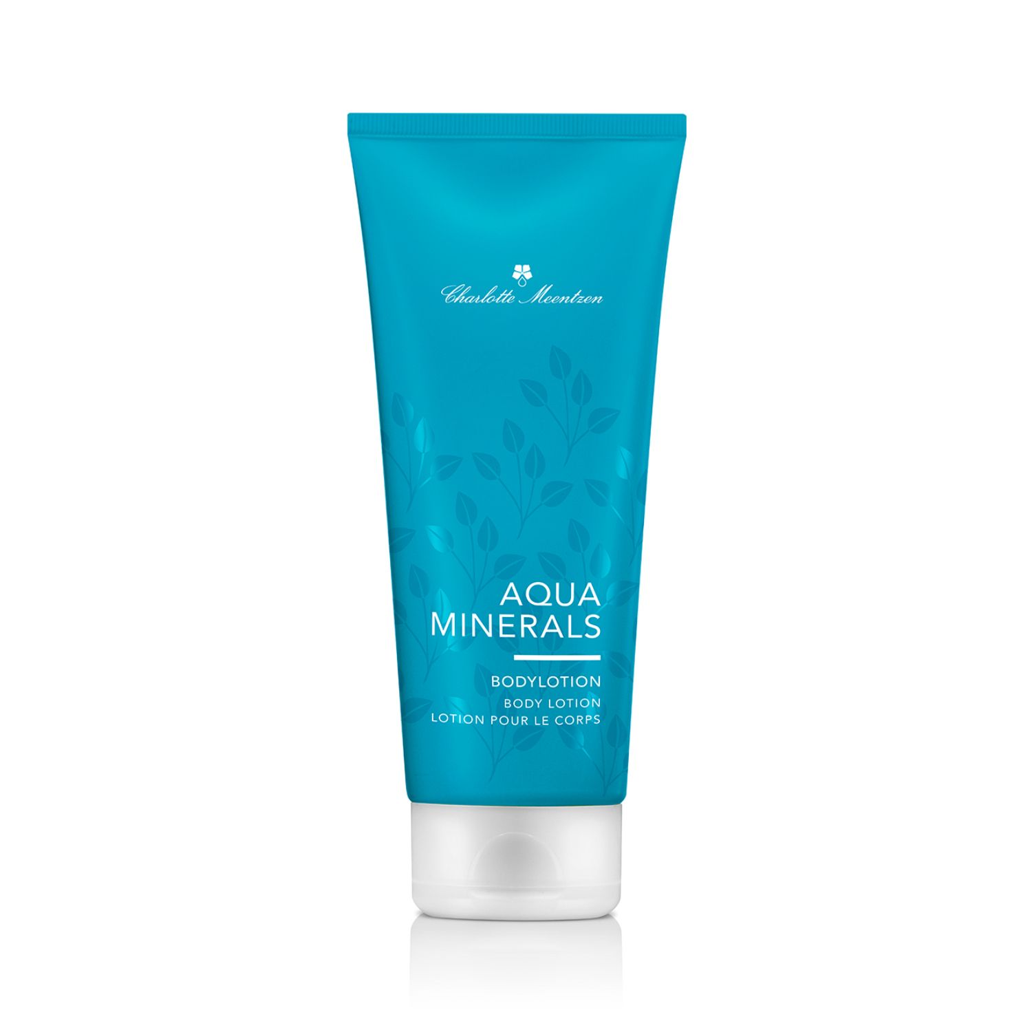 Türkise Tube Charlotte Meentzen Aqua Minerals Bodylotion mit weißem Klappdeckel und Blattmuster.