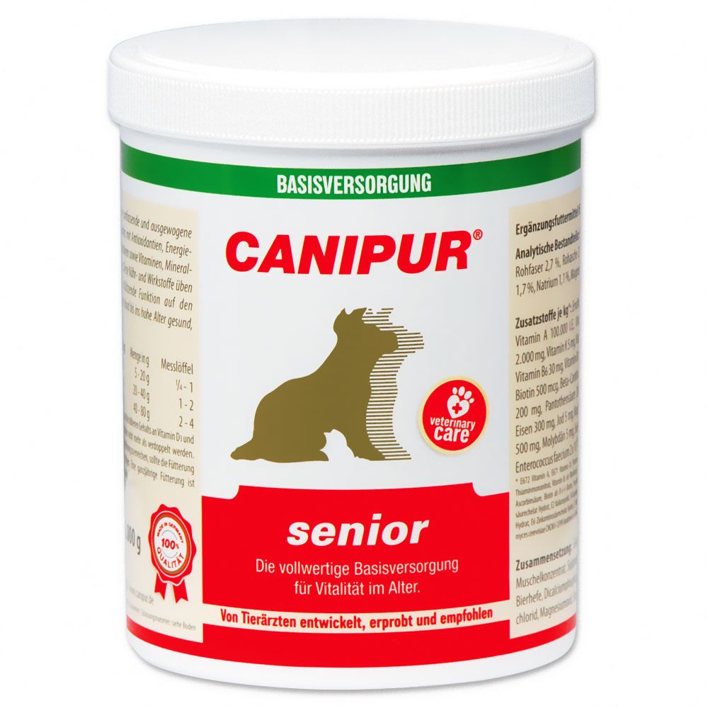 Weißes, zylindrisches Behältnis mit grünem und rotem Etikett. Aufschrift CANIPUR senior, Logo mit Hund. Basisversorgung für Vitalität im Alter.
