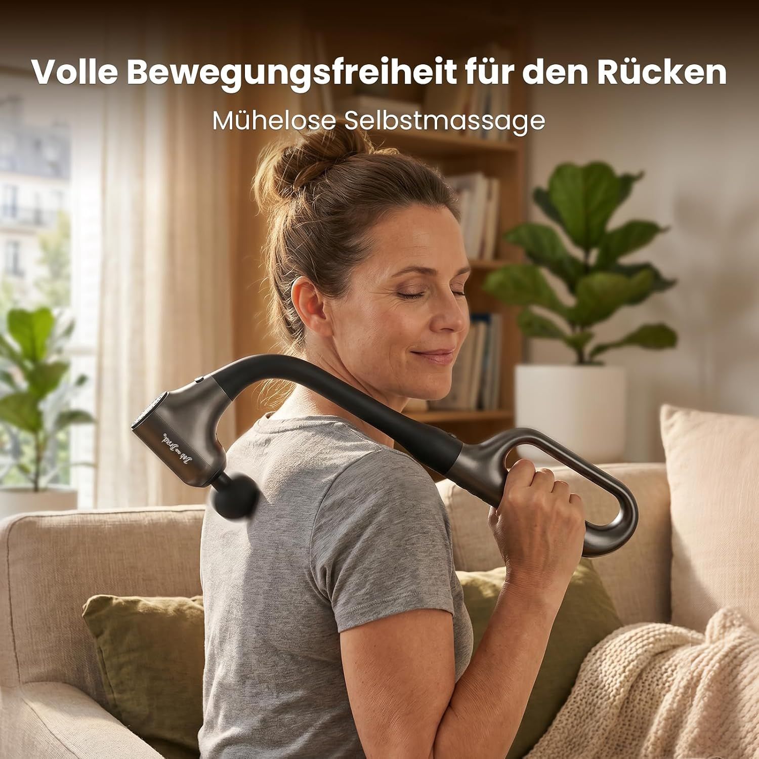 Massagegerät mit abnehmbarem D-Griff und Snap-Lock-Verbindung.