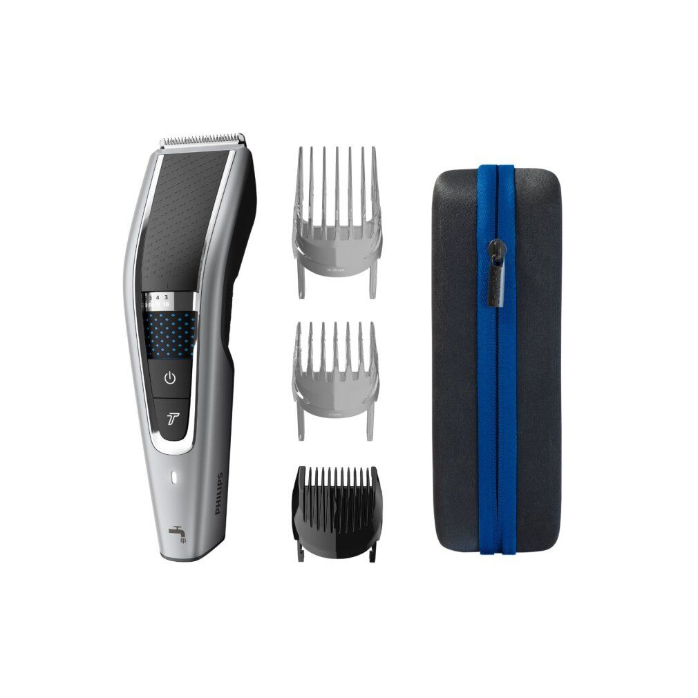 Philips Haarschneider Series 5000 mit Zubehör. Silber-schwarzes Gerät, drei Kammaufsätze, schwarze und blaue Aufbewahrungstasche mit Reißverschluss.