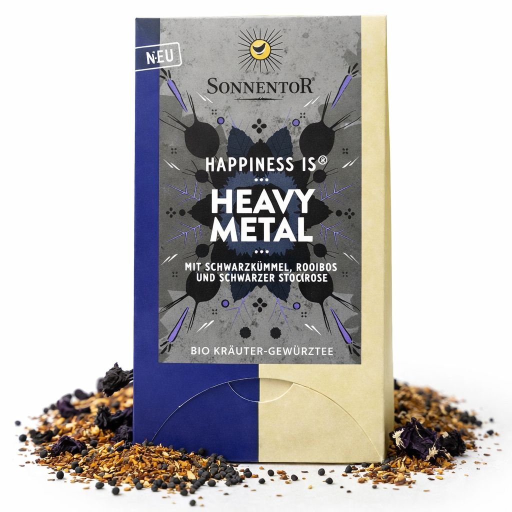 SonnenTor Heavy Metal Tee Schachtel mit losem Tee und Tasse Tee.