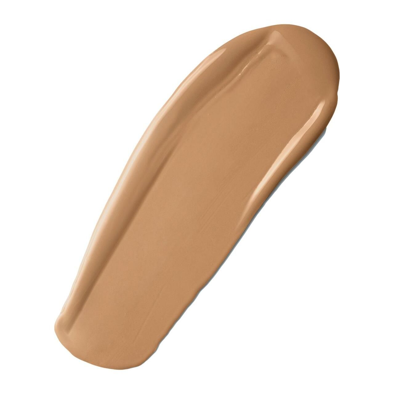 Beiger Foundation-Strich auf weißem Hintergrund. Glatte Textur, leicht glänzend. Keine Verpackung oder Beschriftung sichtbar.