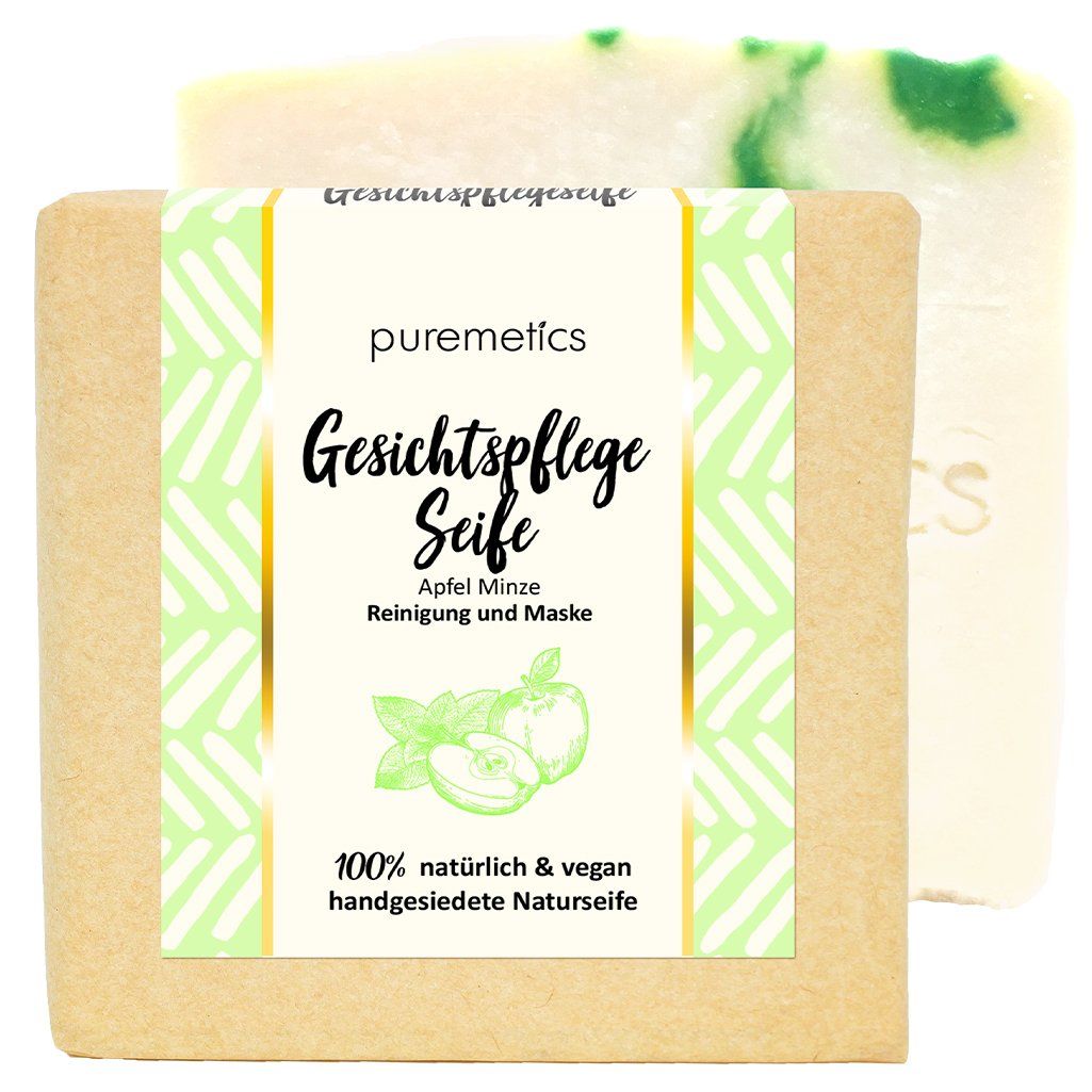 Gesichtspflegeseife mit Etikett. Etikett mit "puremetics", "Gesichtspflege Seife", "Apfel Minze", Illustrationen und Text. 100% natürlich & vegan.