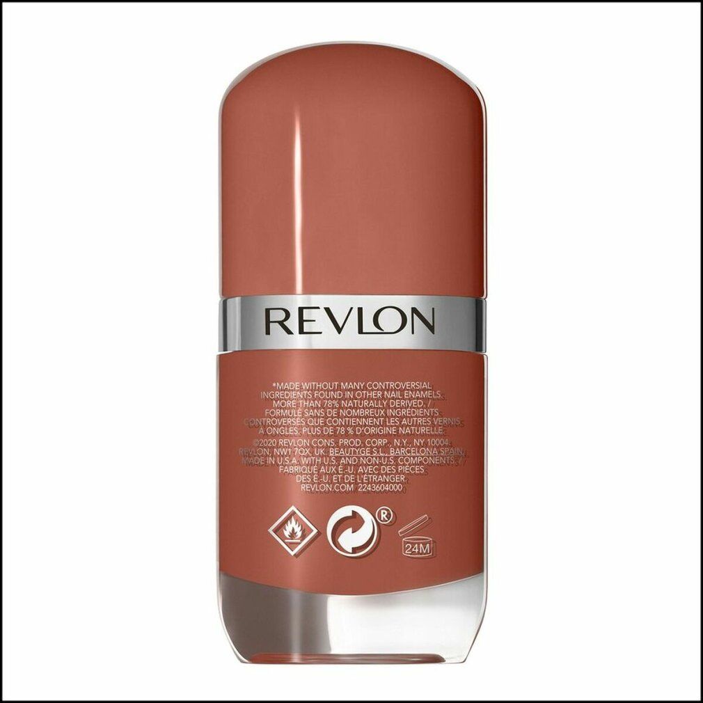 Rückseite der Nagellackflasche. Textinformationen, darunter "Revlon". Symbole für brennbare Stoffe und Recycling.