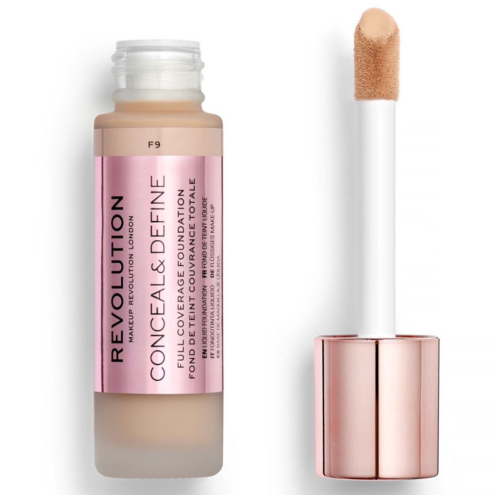 Flüssige Foundation in Glasflasche mit Applikator. Rosa Etikett mit Produktnamen und Marke. Farbton F9.