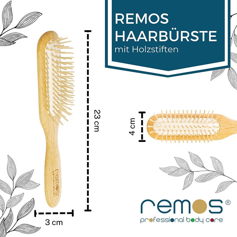 REMOs Haarbürste mit Holzstiften. Maße: 23 cm Länge, 4 cm Breite, 3 cm Griffbreite.